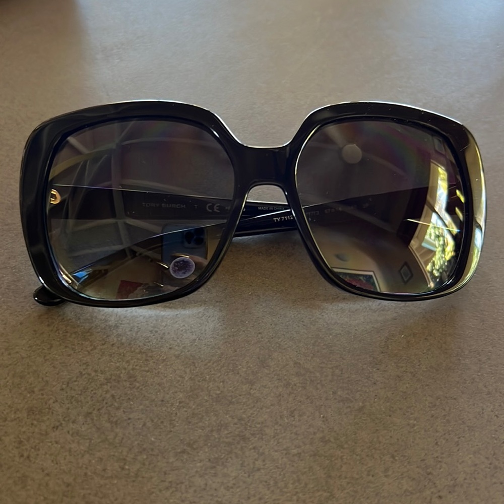 Tory Burch sunglasses. Brand new. In case. Black frames black lenses. Polarized!